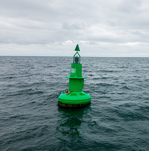 green-navigational-buoy-in-sea-with-clouds-slow-mo-2022-12-10-01-12-41-utc-500x506